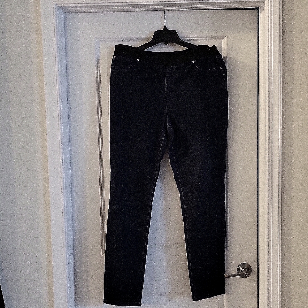 Dark blue jeans, with a 3.5 " spandex waist band. Size 16